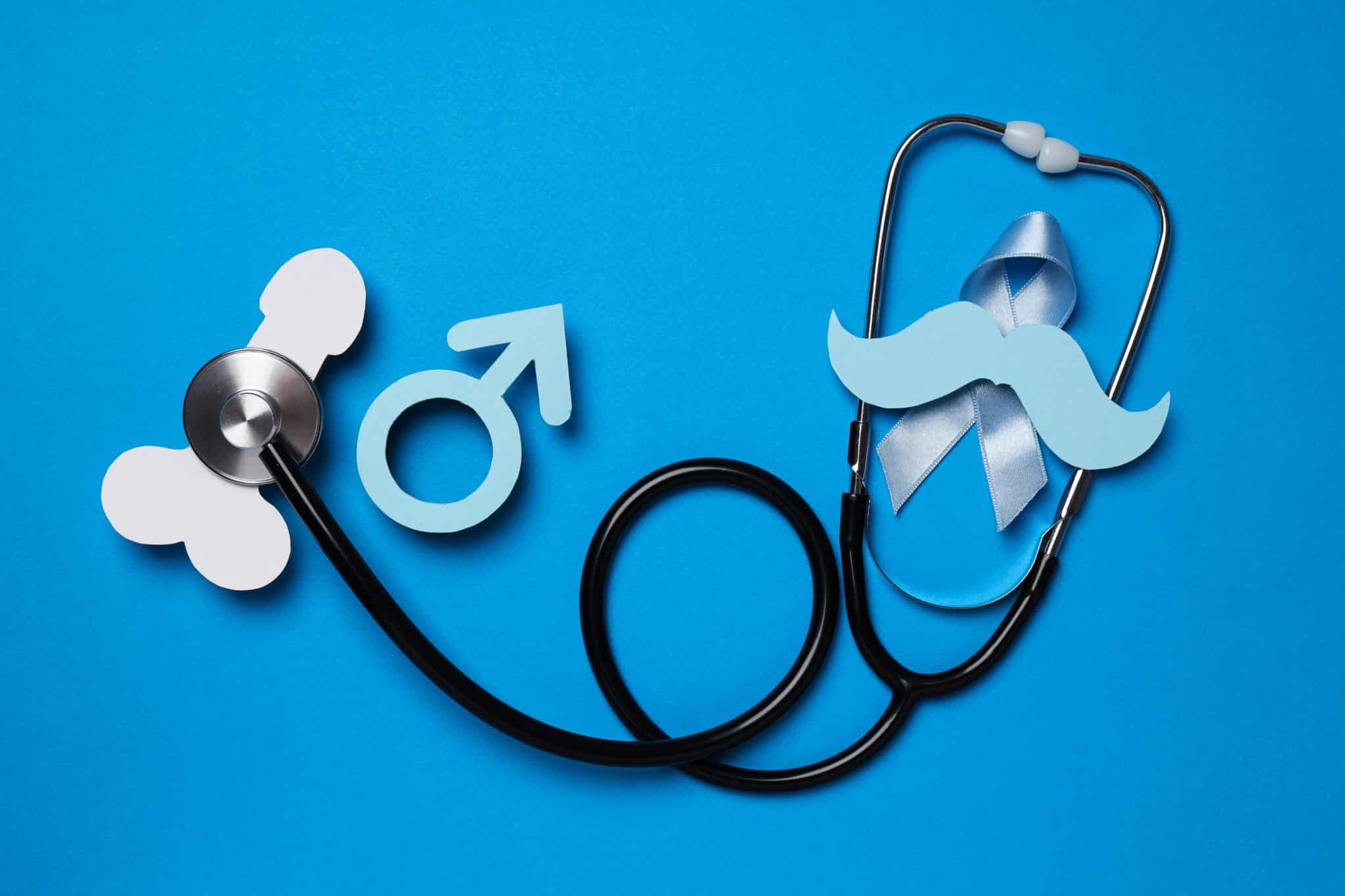 Stethoscope with paper mustache and blue ribbon, Movember concep